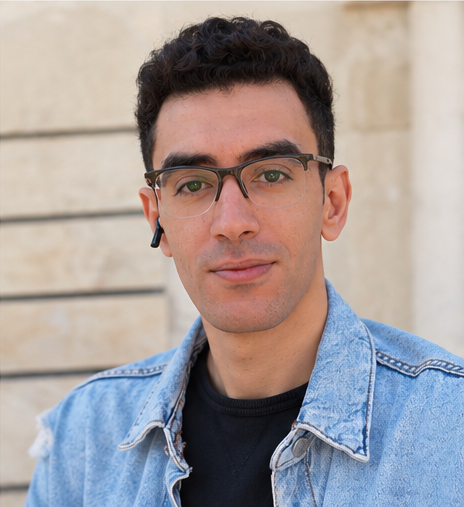 Mohamed Sonbol in a denim jacket